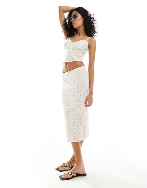 SNDYS - Coordinato con top a canottiera con laccetto frontale e gonna midi con stampa vintage a fiori