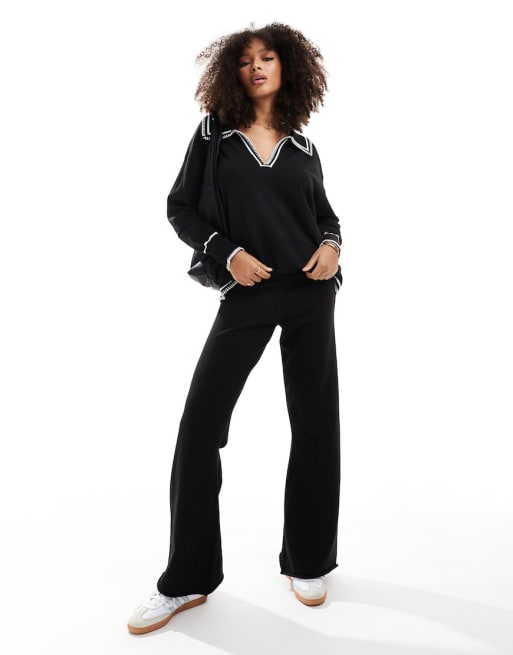SNDYS – Schwarz-weißes Strickset mit Pullover mit Kragendetail und Hose mit weitem Bein 