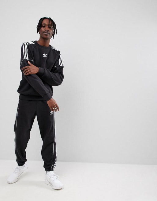 Sort Nova joggingsæt fra adidas Originals 