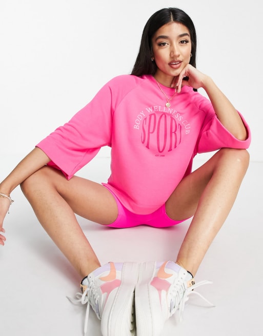 Stradivarius - Ensemble avec sweat oversize et short legging - Rose pop