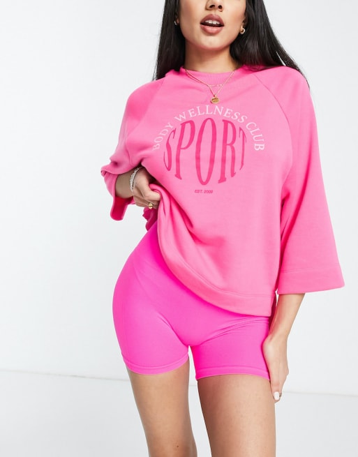 Stradivarius - Ensemble avec sweat oversize et short legging - Rose pop