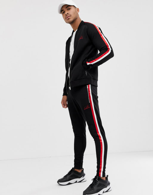 The Couture Club tracksuit in black with red stripe stripe | ASOS