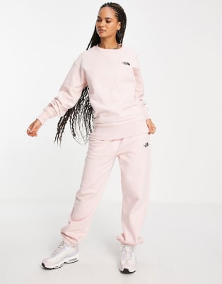 The North Face Essential sweat set in pink Exclusive at ASOS, 1 of 3