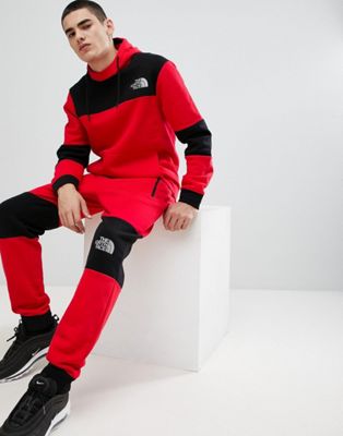 red north face tracksuit
