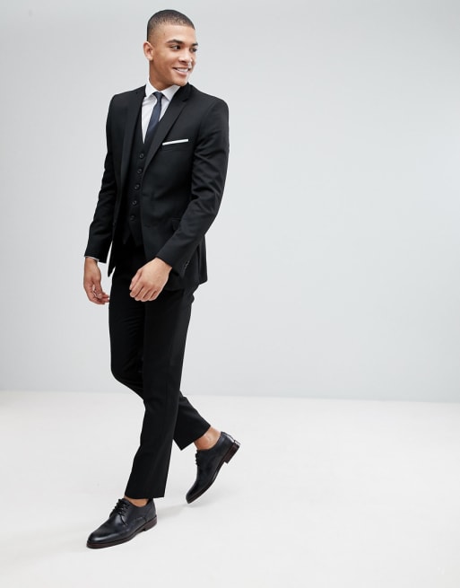 Traje ajustado con diseño negro de Moss London 