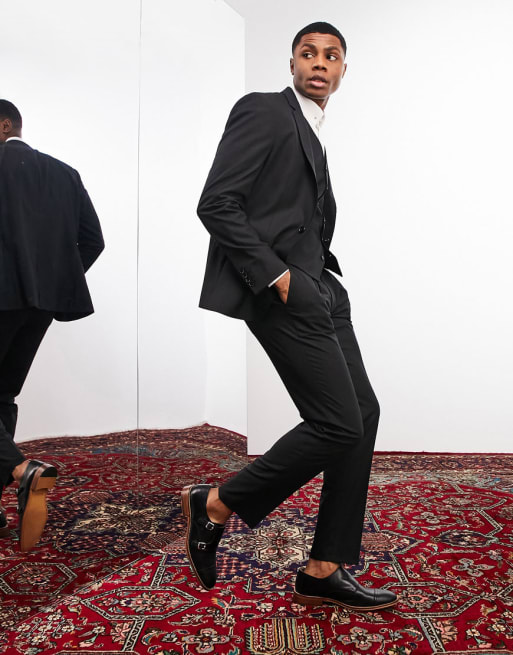 Traje negro de corte slim de tejido elástico en dos direcciones 
