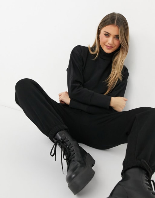 black sweater and sweatpants