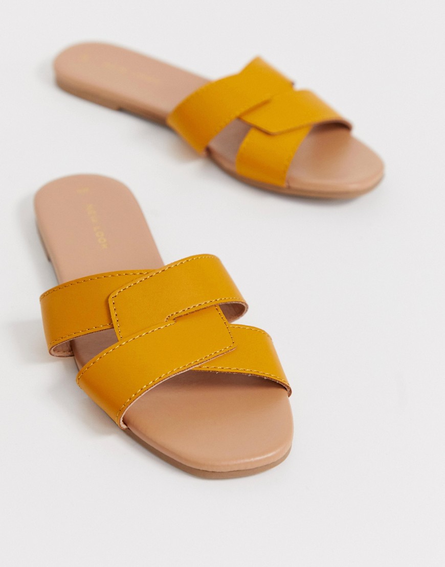 New Look cross strap flat slider sandal in dark yellow