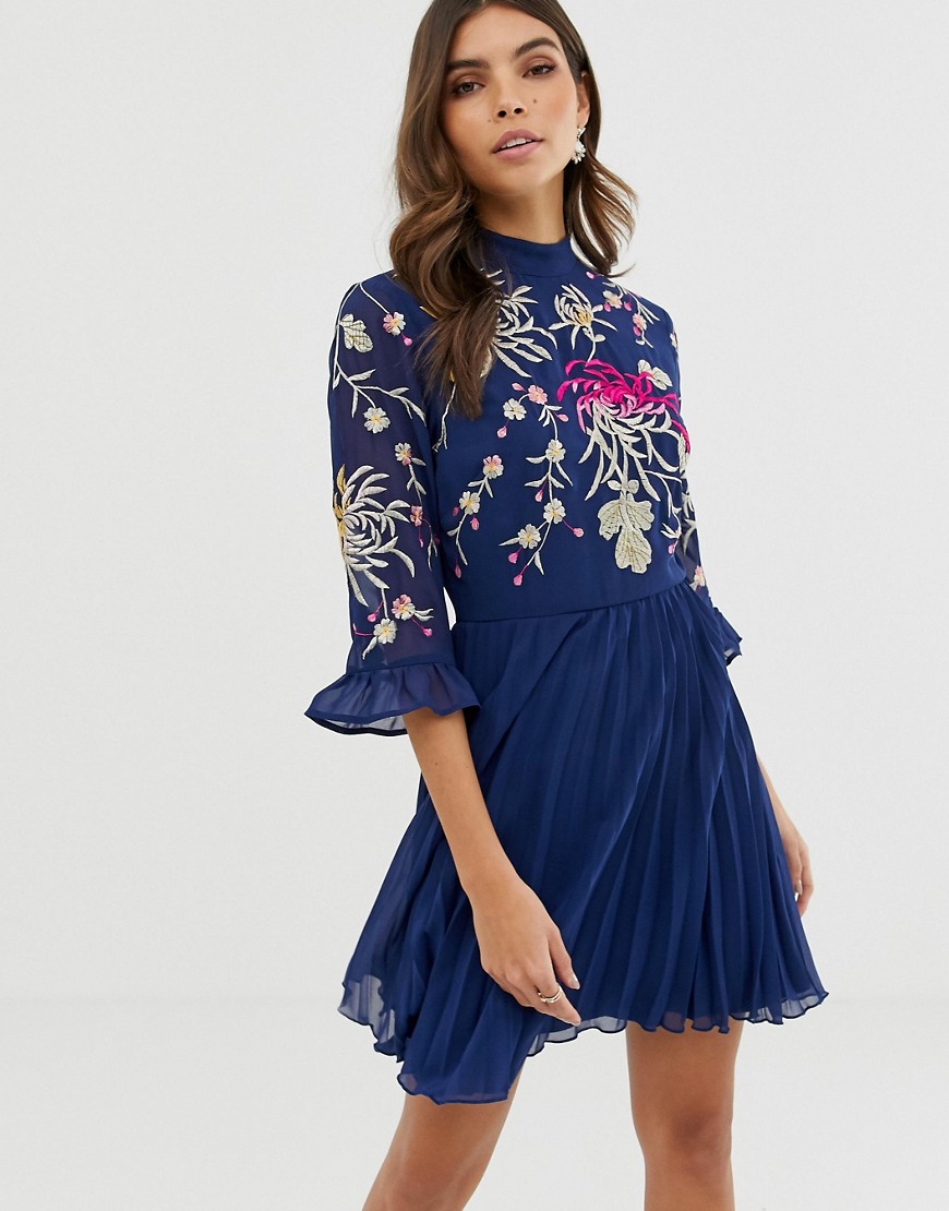 ASOS DESIGN embroidered pleated mini dress with fluted sleeve