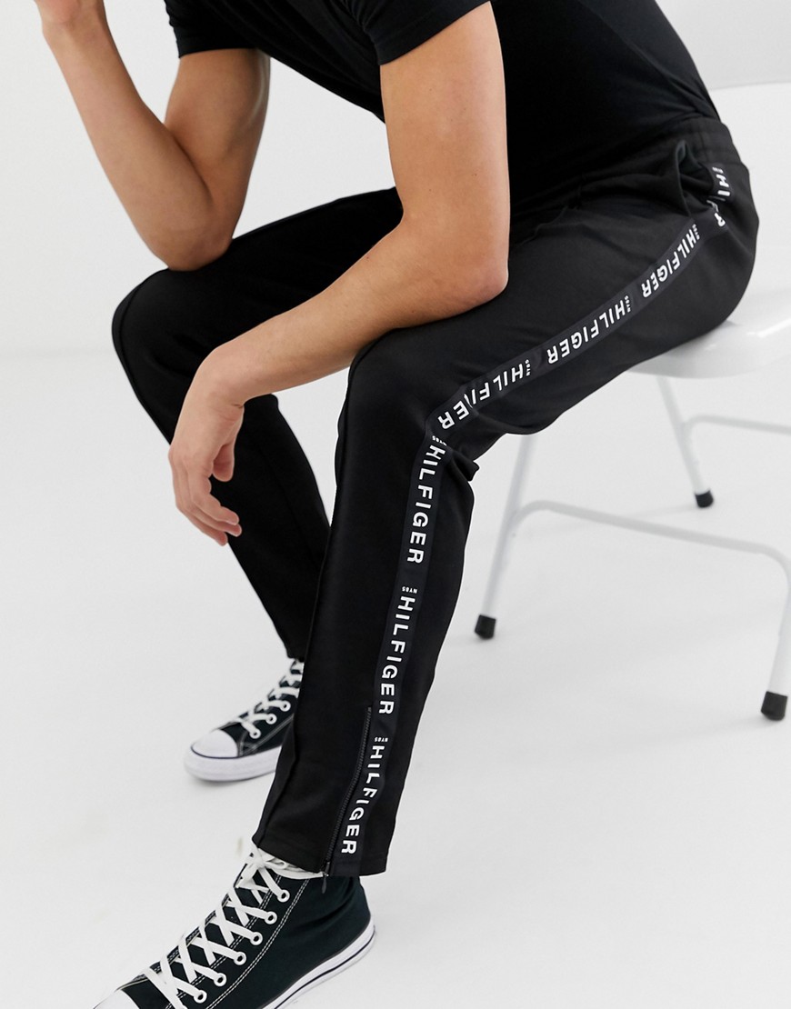 Tommy Hilfiger sports tricot tech tape logo joggers zip hem in black