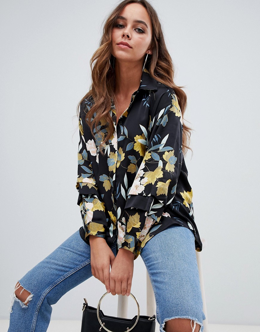 PrettyLittleThing frill sleeve shirt in navy floral