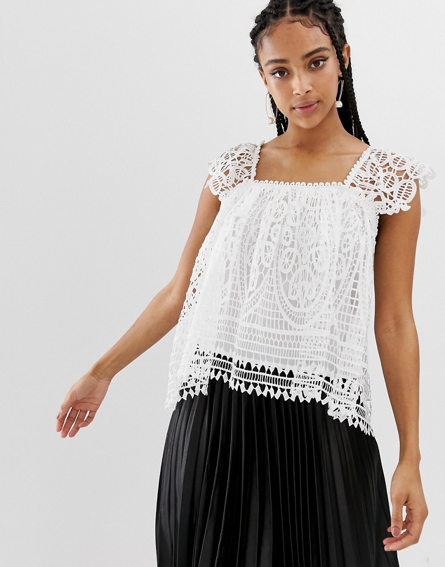 Amy Lynn broderie lace low back top