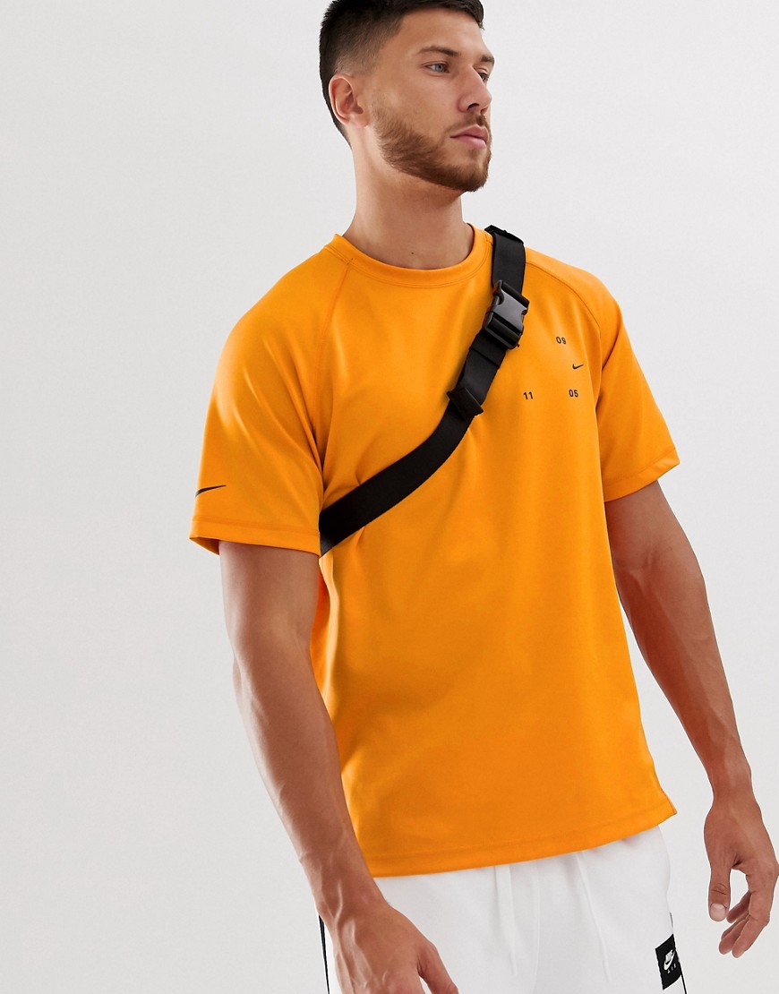 Nike Tech Pack T-Shirt in Orange
