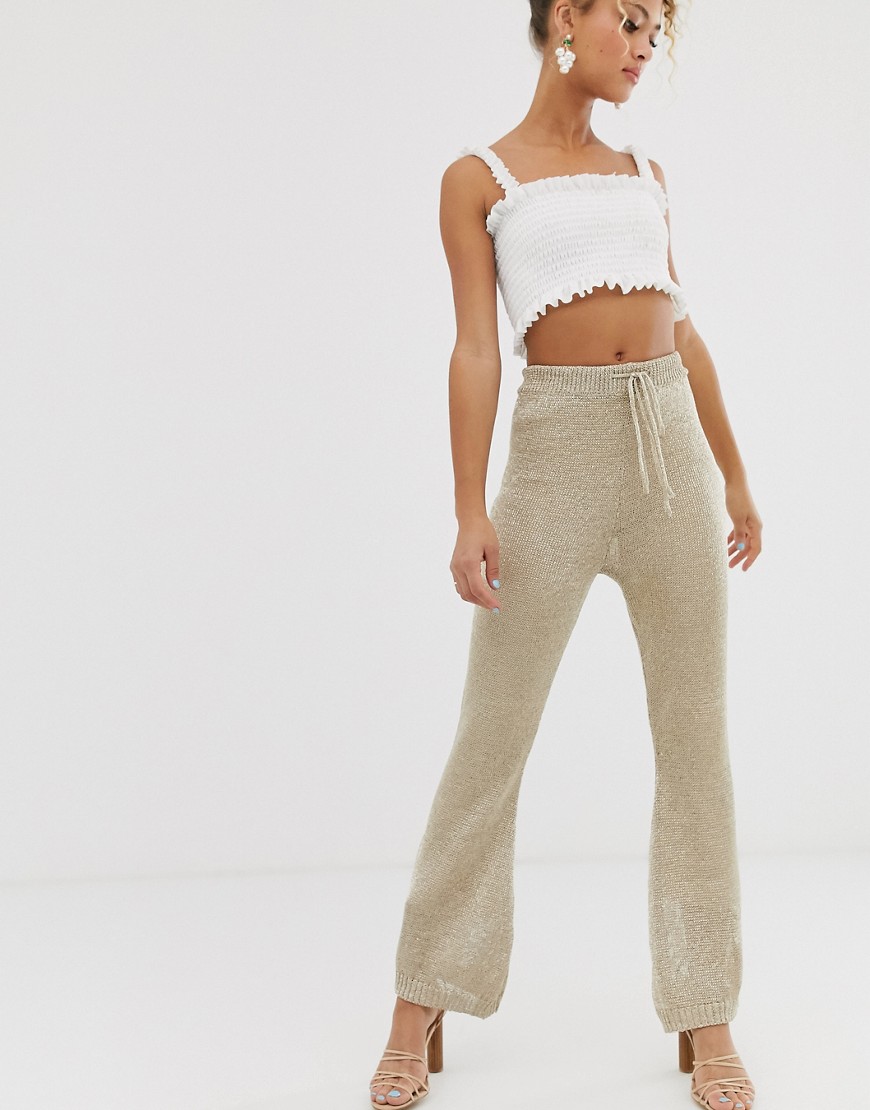 Never Fully Dressed metallic knitted flare trouser co-ord in light gold