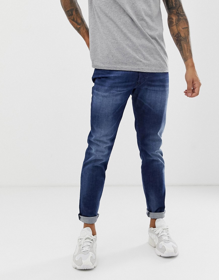 Diesel D-Bazer tapered slim fit jeans in 084GR mid wash