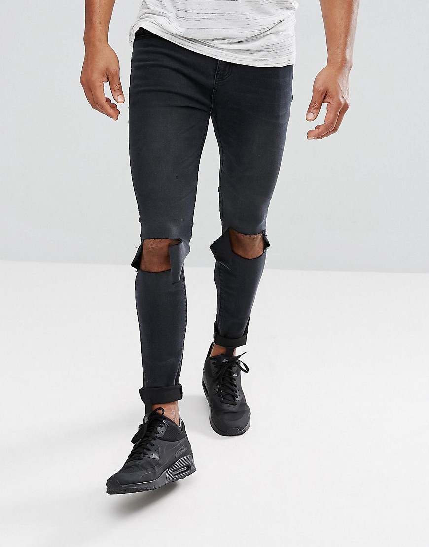 boohooMAN Super Skinny Jeans With Knee Rips In Black Wash
