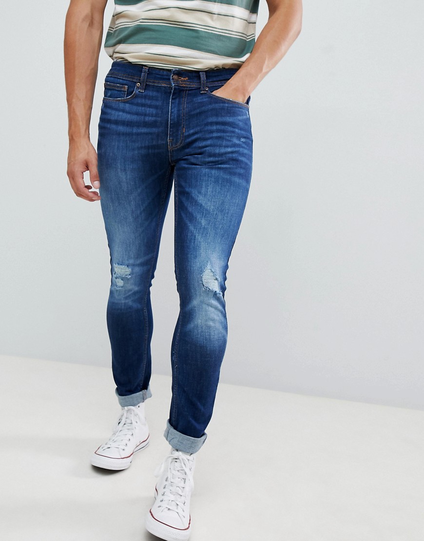 Burton Menswear skinny fit jeans in mid wash