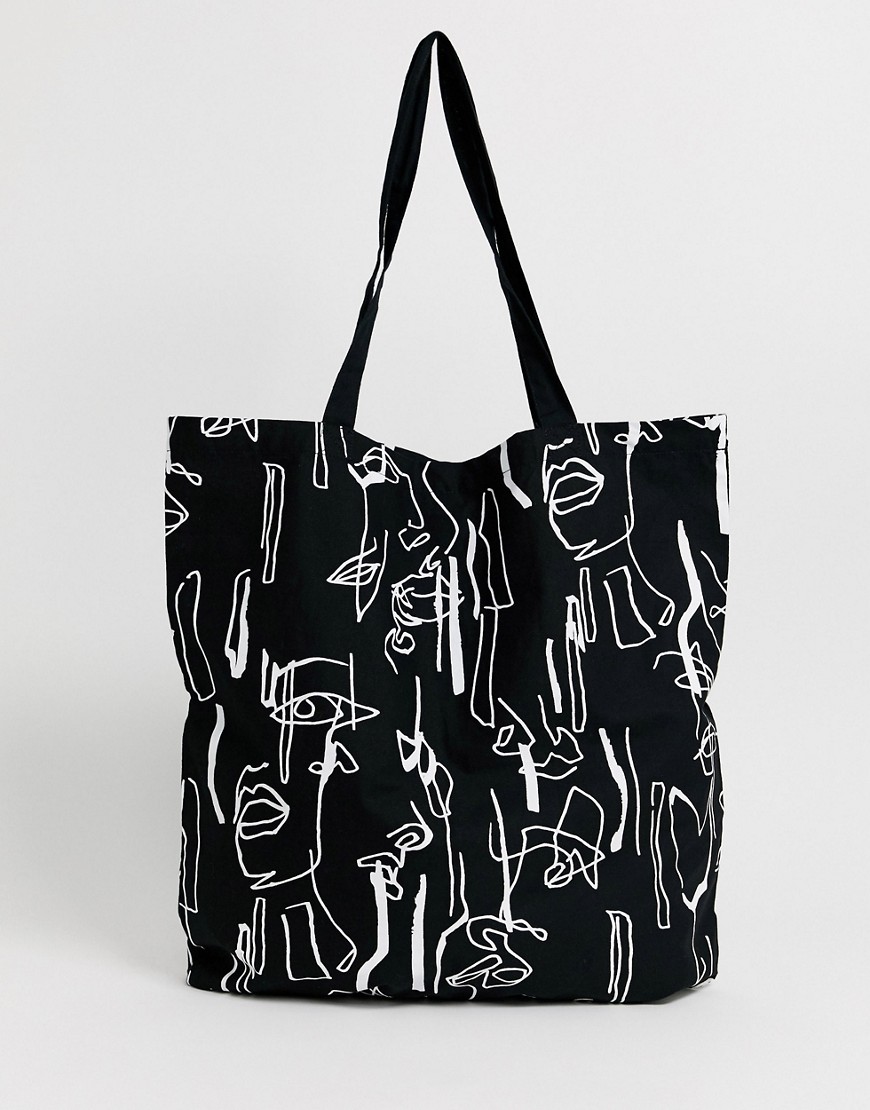 ASOS DESIGN large cotton shopper bag in abstract face print