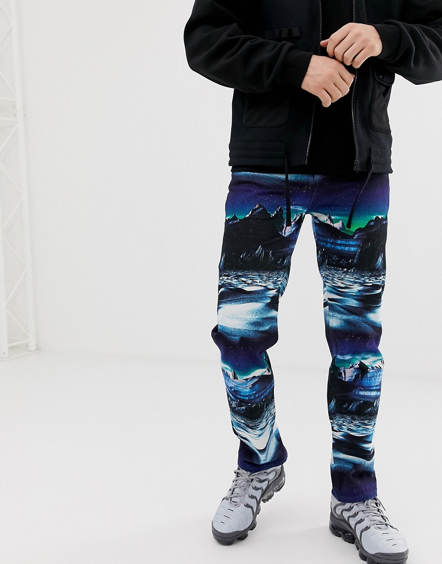 ASOS DESIGN original fit jeans with planet print