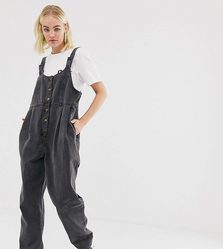 Reclaimed Vintage inspired denim jumpsuit with button front and buckle detail