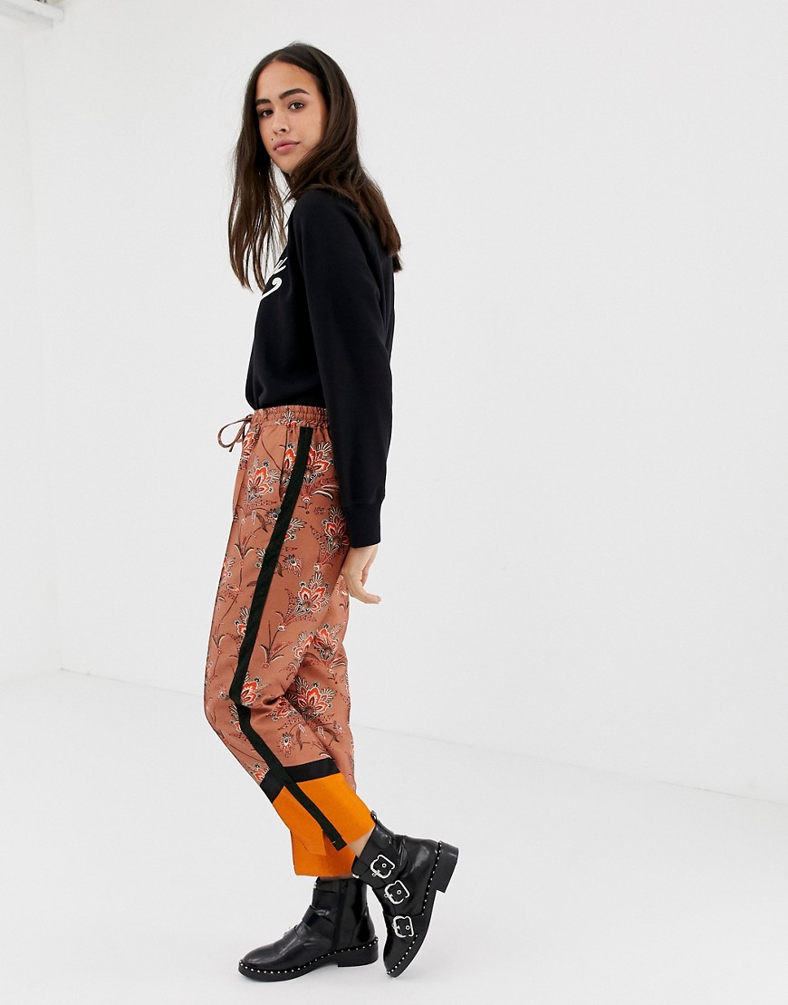 Maison Scotch floral and contrast panel print trousers