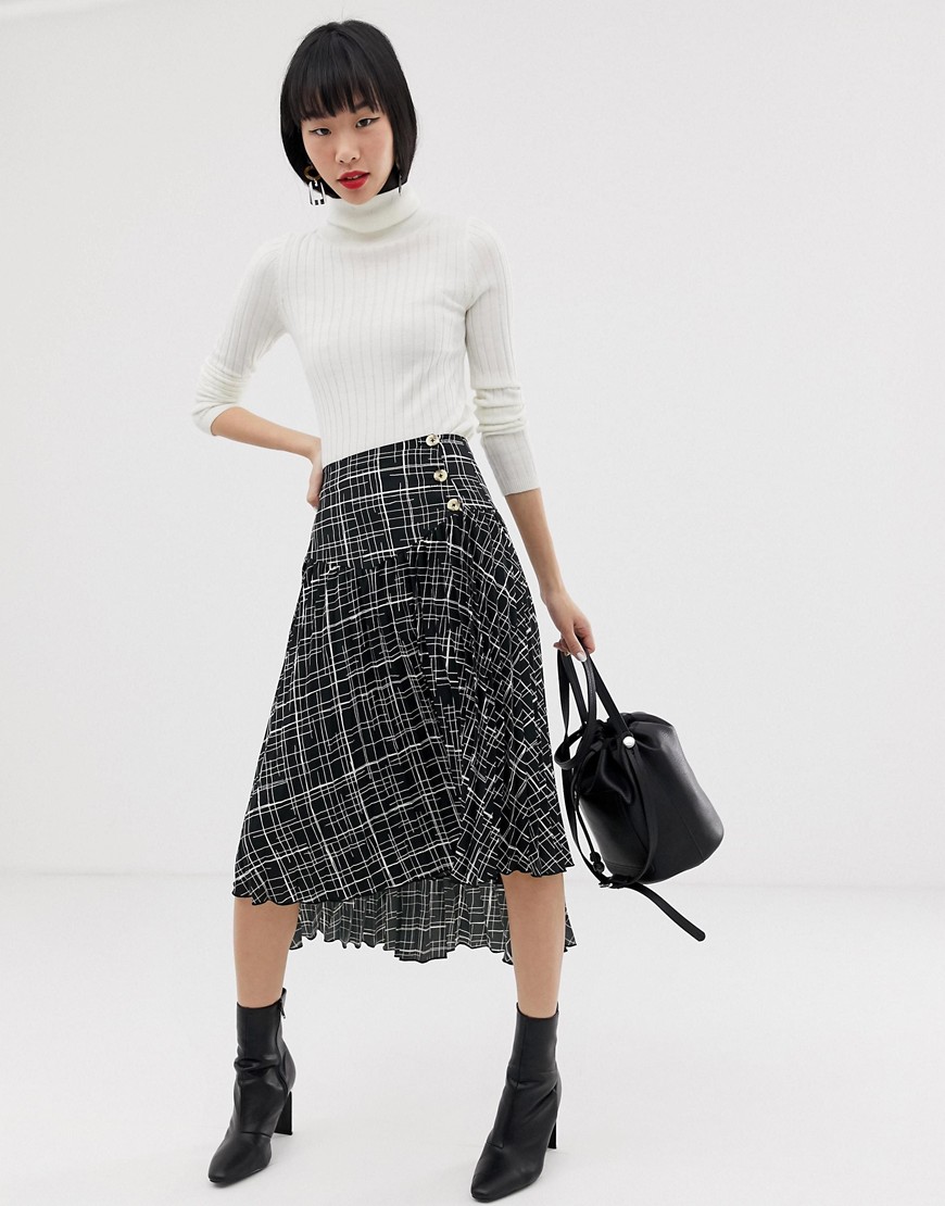 ASOS DESIGN pleated midi skirt in mono grid print with buttons and step hem