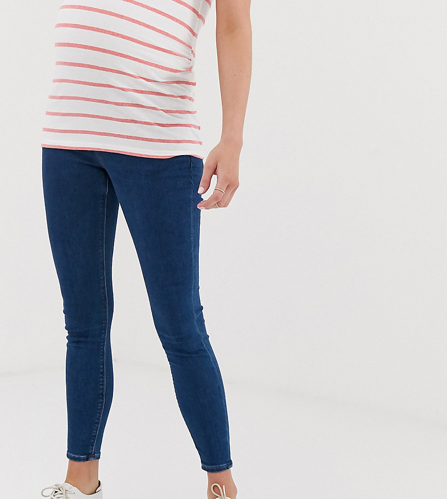 ASOS DESIGN Maternity high rise ridley 'skinny' jeans in rich mid blue wash with under the bump waistband