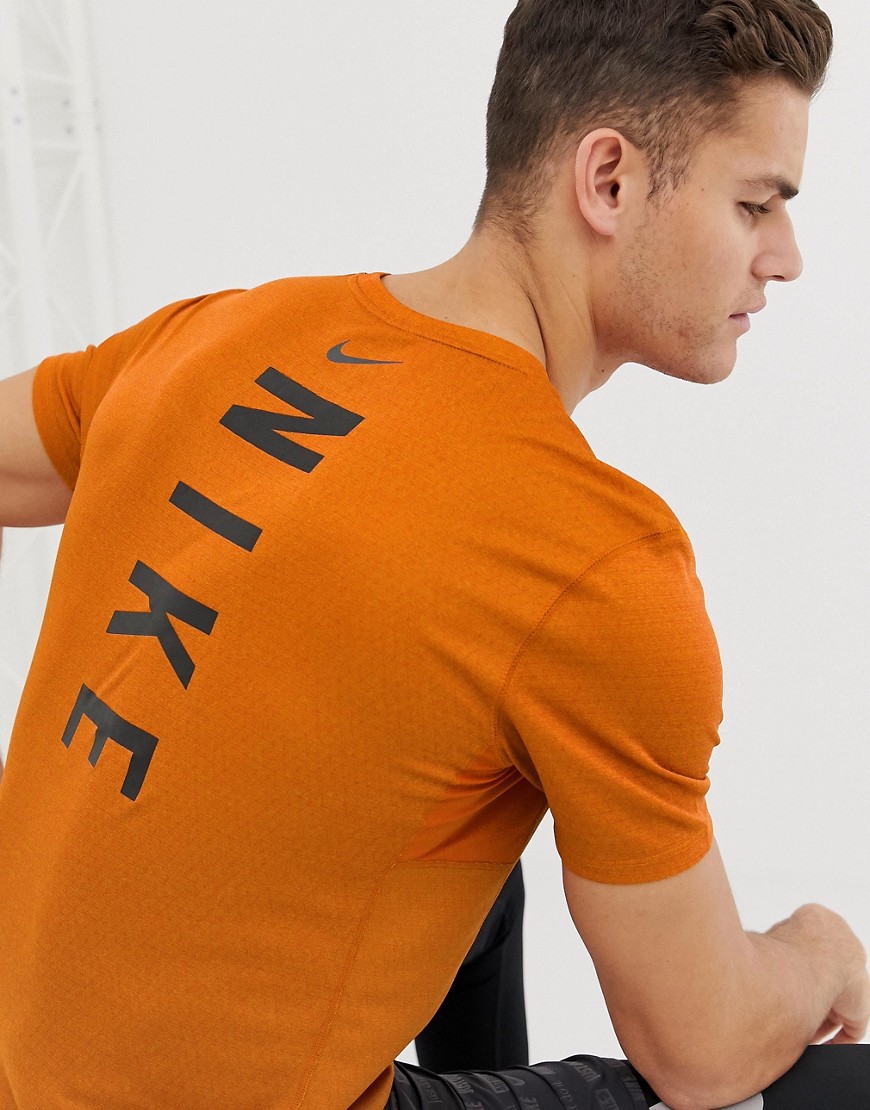 Nike Running Miler Tech T-Shirt With Back Print In Orange 928307-833