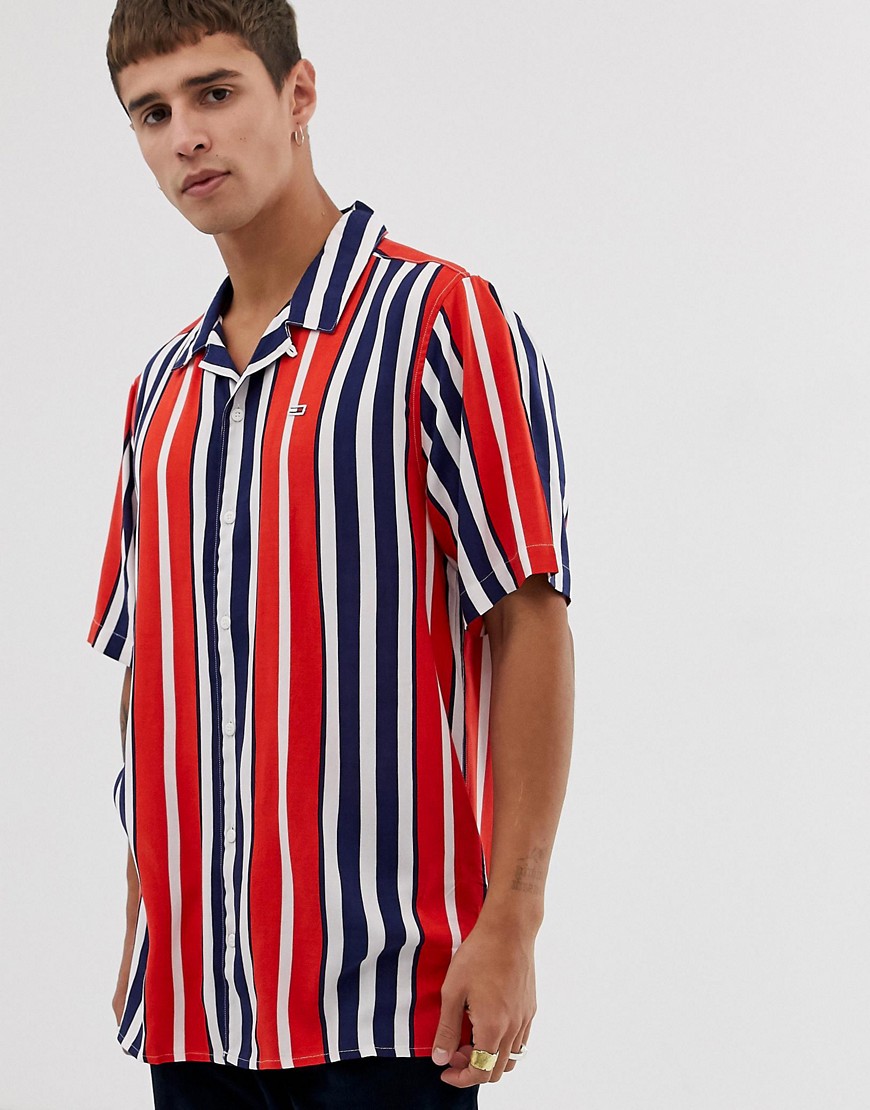 Tommy Jeans vertical stripe short sleeve shirt with flag logo in red