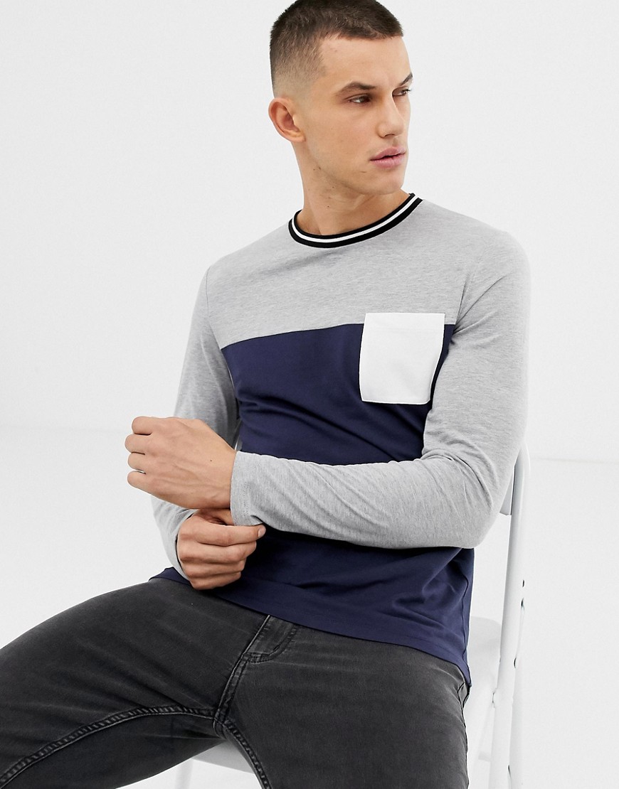 ASOS DESIGN long sleeve t-shirt with contrast yoke and pocket in navy
