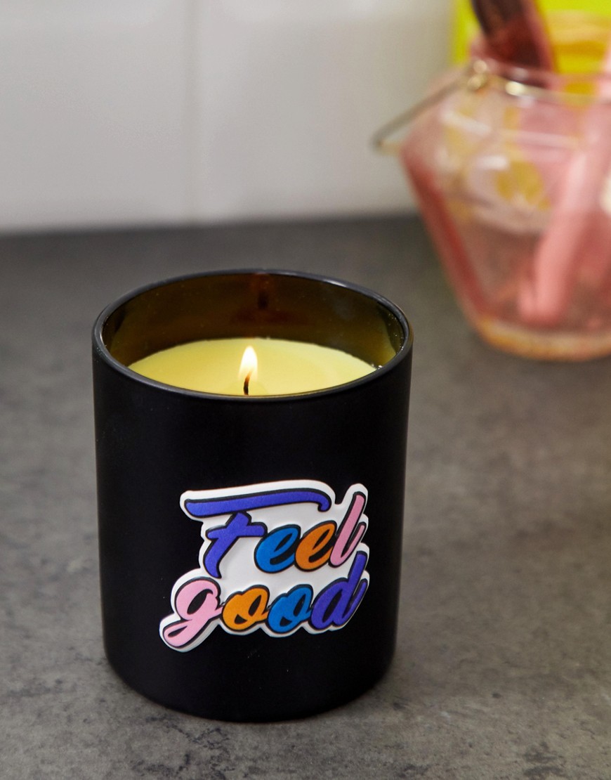 River Island candle with slogan in black