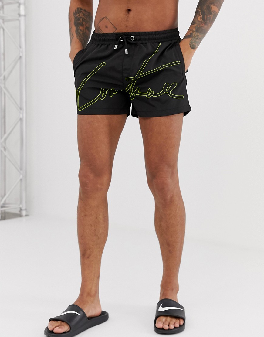 The Couture Club swim shorts with neon logo in black