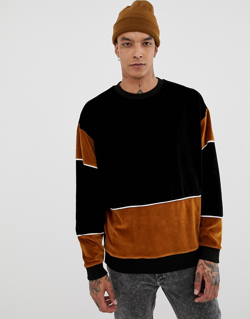 ASOS DESIGN oversized sweatshirt in velour with colour blocking in black and brown
