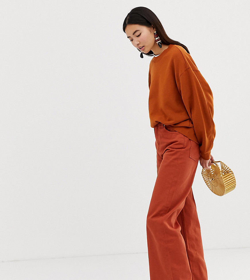 Weekday Ace organic cotton wide leg jeans in rust