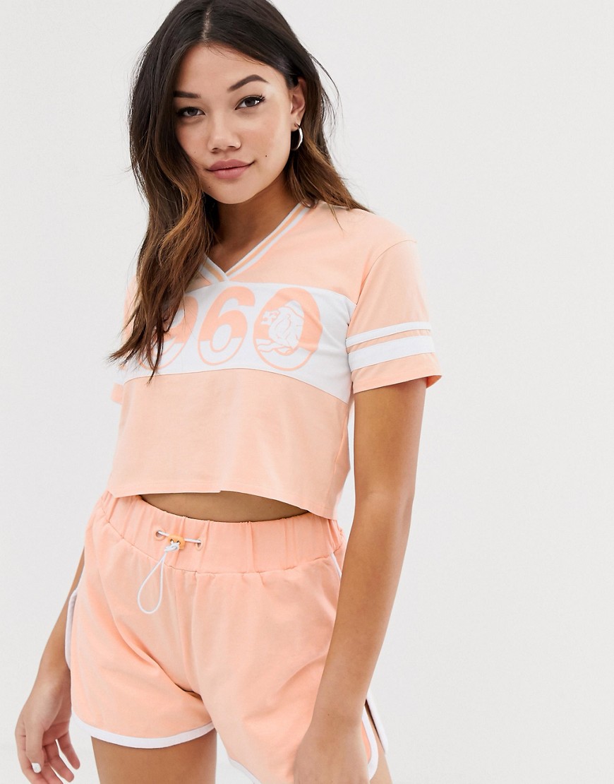 Lonsdale cropped varsity v neck t-shirt in peach