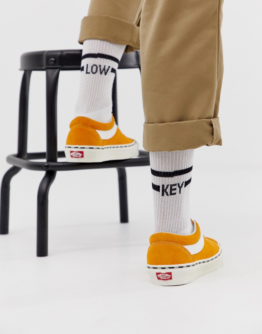 ASOS DESIGN sports socks with low key slogan