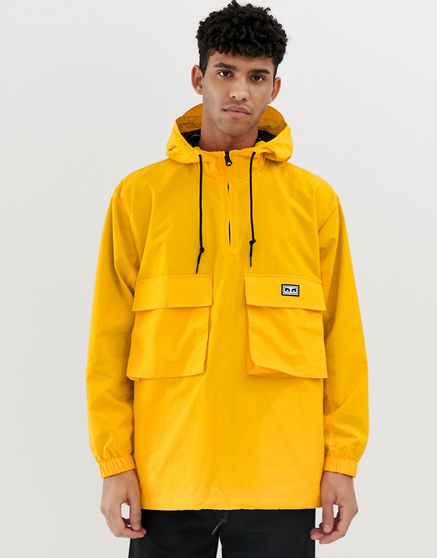 Obey Inlet overhead anorak jacket with reflective back logo in yellow