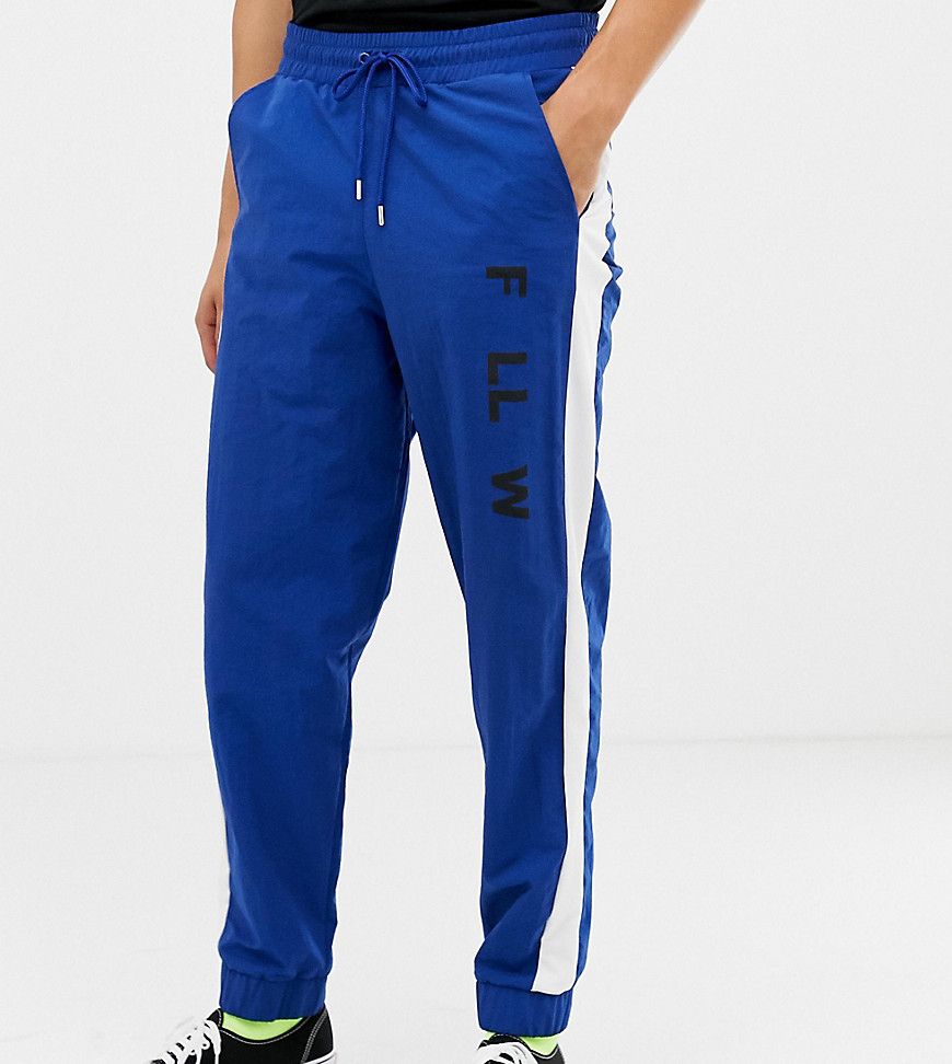 COLLUSION Tall woven jogger with side stripe in blue