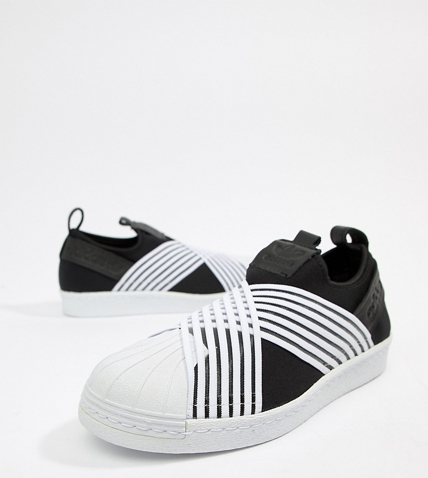 adidas originals superstar slip on sneakers in black and white