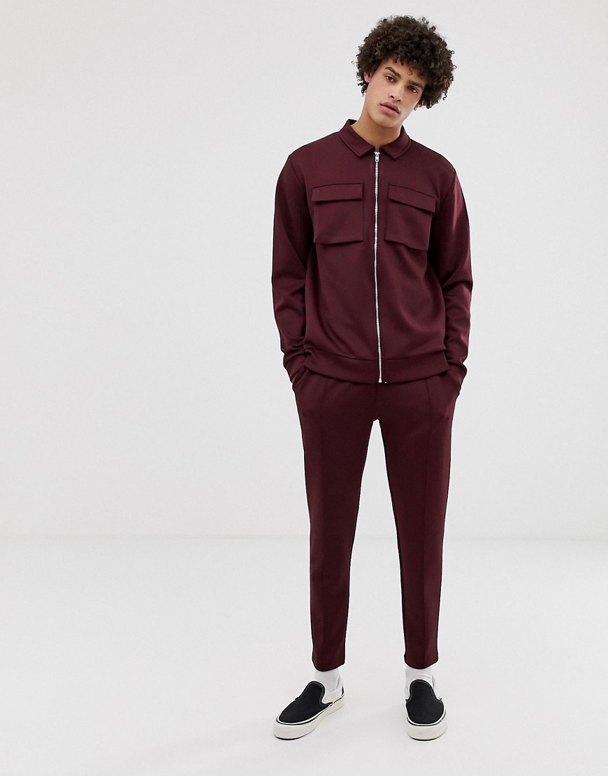 ASOS DESIGN poly tricot tracksuit harrington jacket/skinny joggers with chest pockets in burgundy