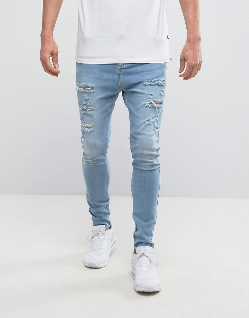 SikSilk Muscle Fit Jeans In Light Wash With Distressing And Zips - Light wash