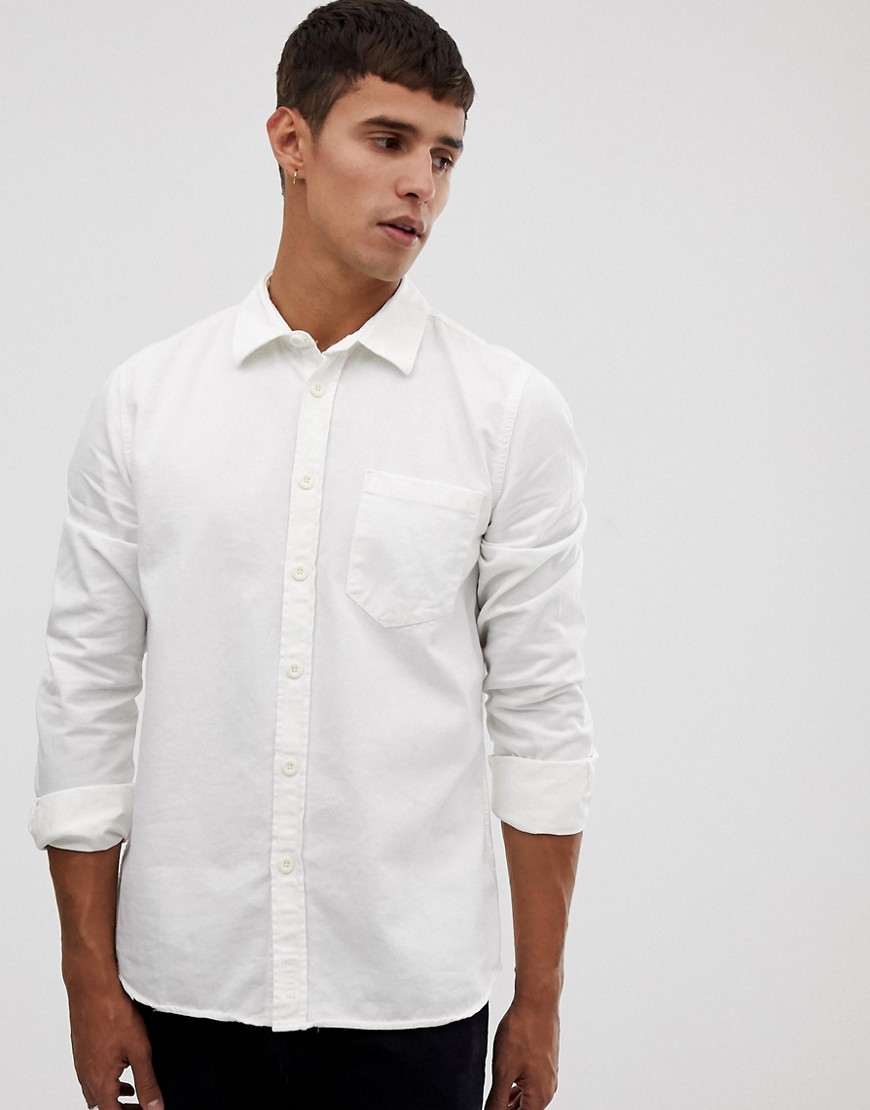 Nudie Jeans Co Henry pigment dye shirt in off white