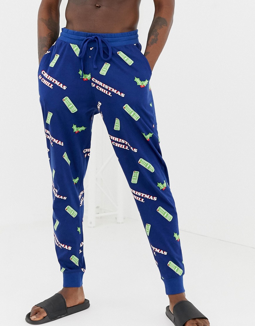 ASOS DESIGN Christmas lounge joggers in christmas & chill print