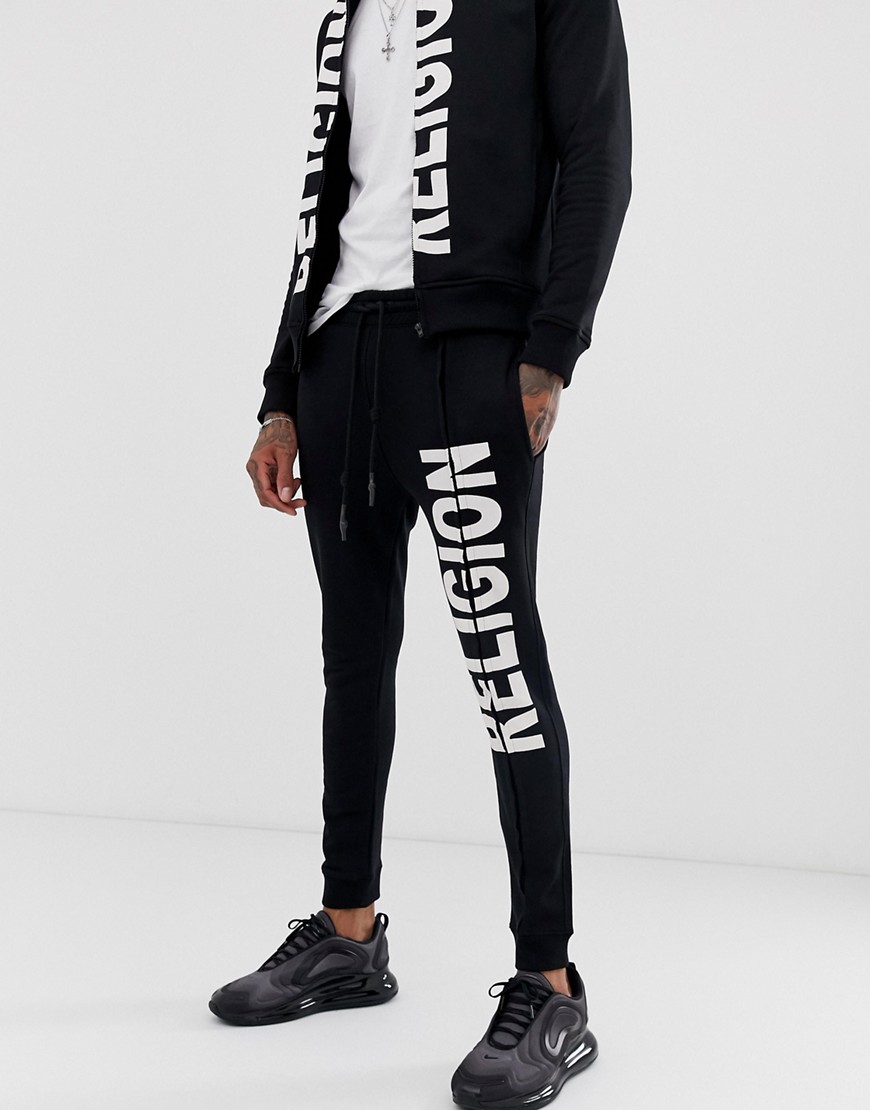 Religion joggers with logo print in black