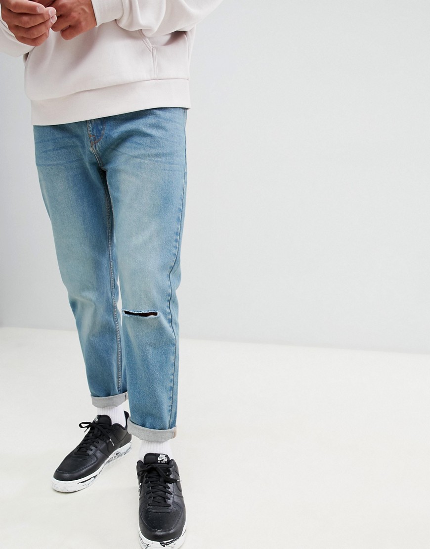 Bellfield carrot fit jeans with knee rip