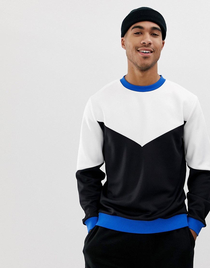 ASOS DESIGN retro track sweatshirt with colour blocking in black and white