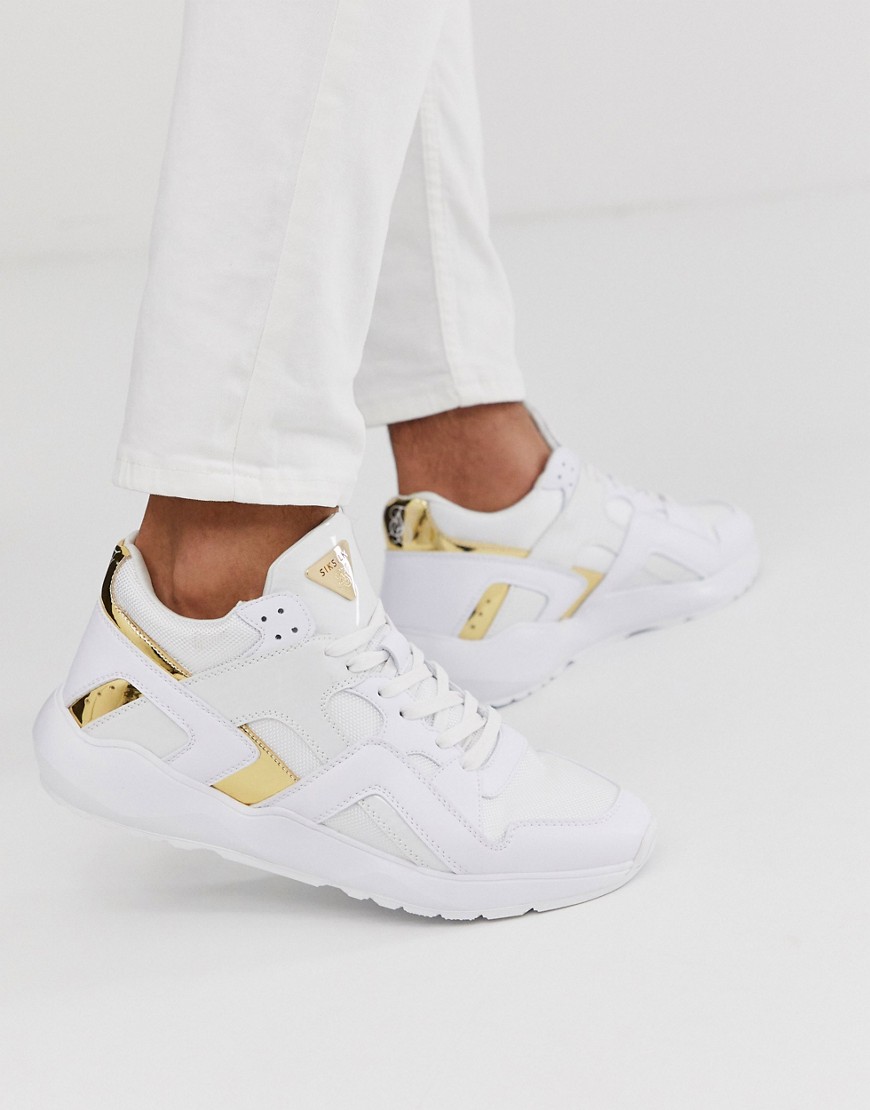 SikSilk trainers in white with gold detail