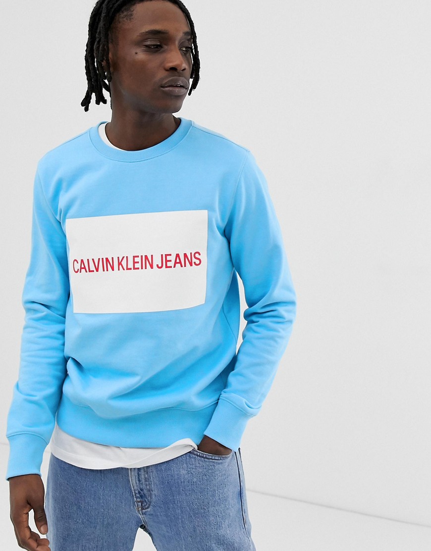 Calvin Klein Jeans large box logo slim fit crew neck sweatshirt in light blue