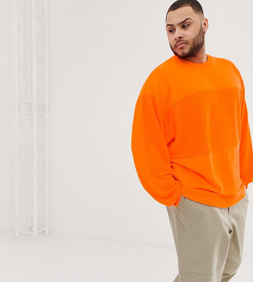 ASOS DESIGN Plus oversized sweatshirt with reverse panel in neon orange