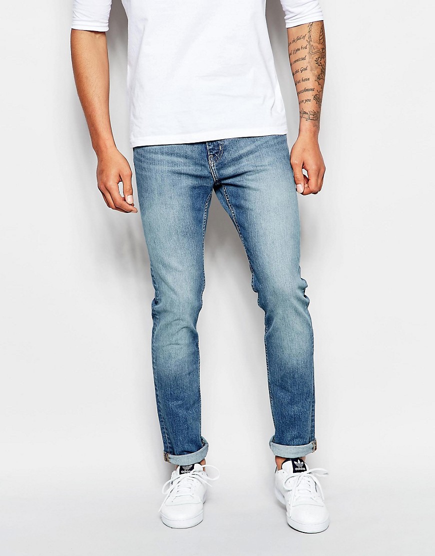 Weekday | Weekday Jeans Friday Skinny Fit Cotton Blue Mid Wash at ASOS